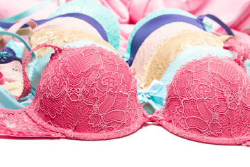 Various colored push-up bras close-up