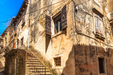 Ancient houses on a stone street in Groznjan village, Istria, Croatia, Europe.