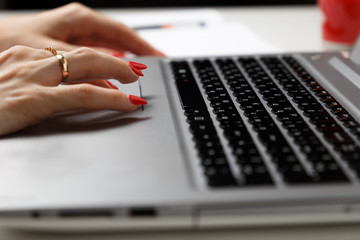 professional business lady working in his office using a laptop, the young female Manager who uses a laptop, the concept of workflow