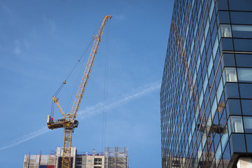 High rise construction crane against a blue sky Cardiff Wales © welshpix