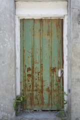 Ruin Old door of industrial building