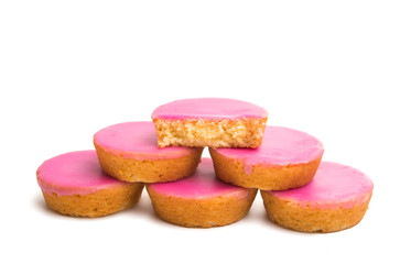 Dutch biscuit in pink glaze isolated