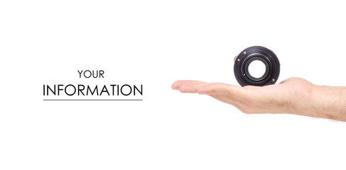 Lens objective in hand pattern on white background isolation