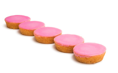 Dutch biscuit in pink glaze isolated