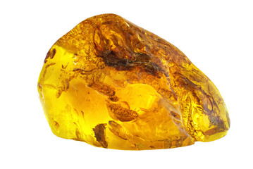 An unusually beautiful piece of amber with patterns and inclusions on a white background. A crystal made of natural natural wood resin resin. Amber material for jewelers. Sun stone, amber texture