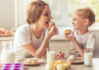 Beautiful Woman and Her Cute Little Daughter