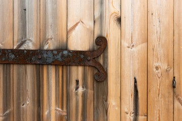 Closeup view of a wing of a wooden gates