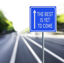 The Best is Yet to Come Road Sign on a Speedy Background.