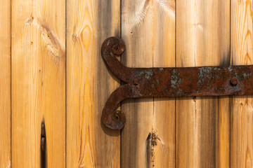 Old metal rusty weathered ancient hinge