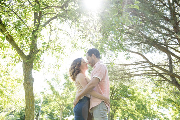 Fototapeta premium man and woman posing in the park