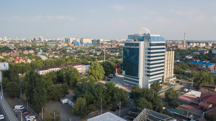 Russia, Krasnodar. City buildings, parkland, overhead aerial view from drone.