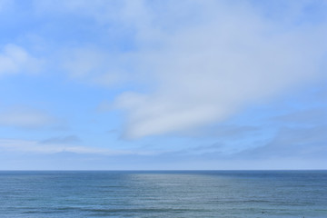 Naklejka na ściany i meble Calm Ocean with Blue Sky