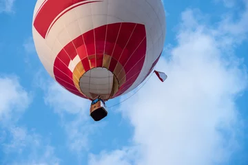 Acrylic prints Air sports Hot air balloon under blue sky.