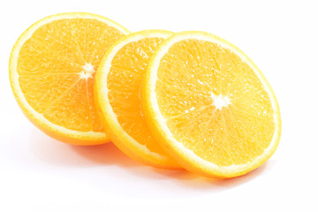 fresh orange slices on a white background