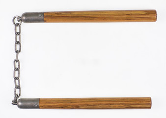 wooden nunchuck on white background