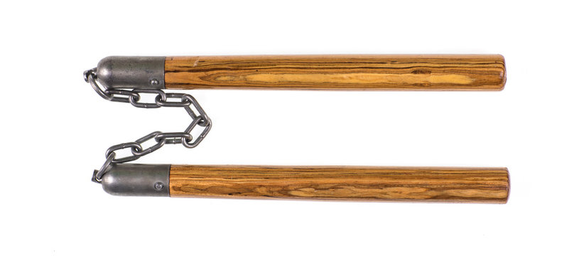 wooden nunchuck on white background