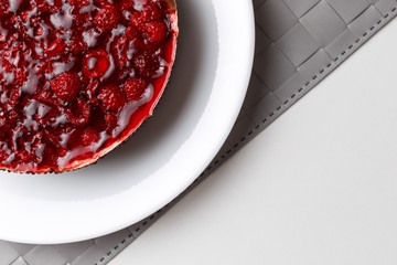 Raspberry jelly cake. Top view, flat, overhead. Copy space and text area. on white background