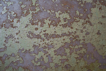 old rusty texture with peeling green paint