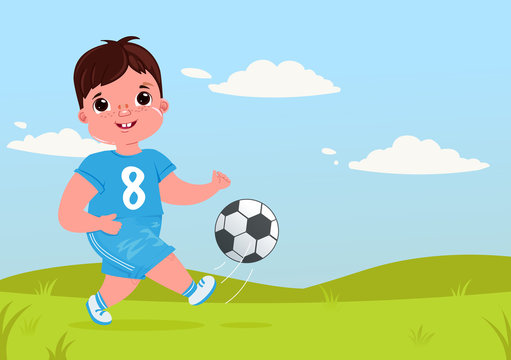 Cute baby boy playing  football with a soccer ball. Player's team modern uniform. Healthy activities