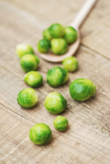 Healthy Food Brussel Sprout Cabbage isolated Rustic Wooden Background