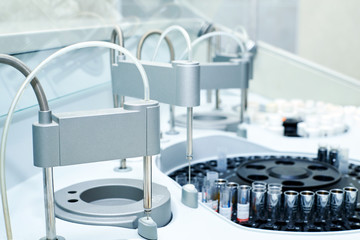 Modern robotical machine for centrifuge blood and urine testing. Medical equipment for automatic...