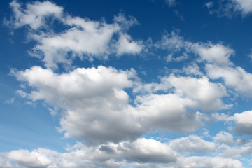  white clouds against blue sky