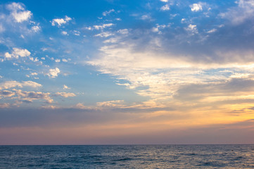 Amazing sea sunset, the sun, waves, clouds