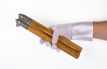 wooden nunchuck on white background