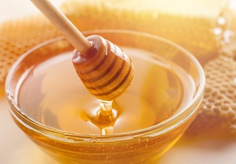 Honey and wooden spoon