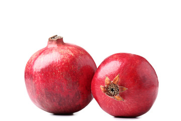 Ripe pomegranate isolated on white background