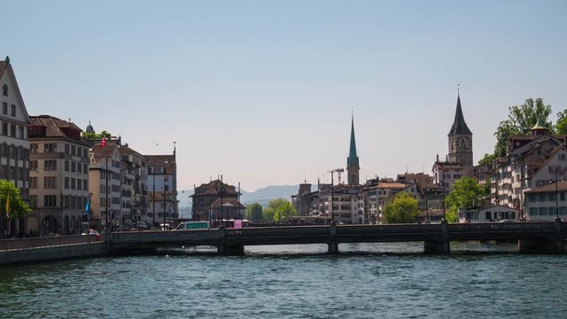 sunny day zurich river cityscape bridge panorama 4k timelapse switzerland
