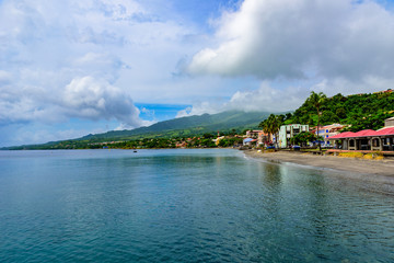 Fototapeta premium Paradise coast at Saint Pierre with Mt. Pelee, active volcanic mountain in Martinique, Caribbean Sea