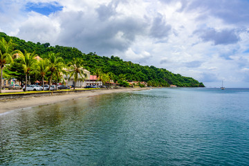 Paradise coast at Saint Pierre with Mt. Pelee, active volcanic mountain in Martinique, Caribbean Sea