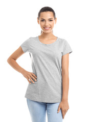 Obraz premium Young woman in t-shirt on white background. Mockup for design