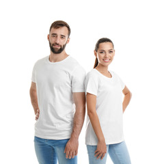 Young couple in t-shirts on white background. Mockup for design