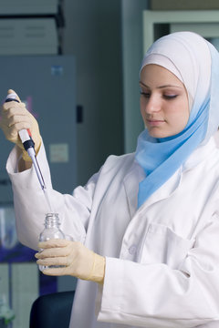 Middle Eastern (Muslim) Woman Doing medical Research