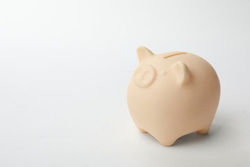 Cute piggy bank on white background. Money saving