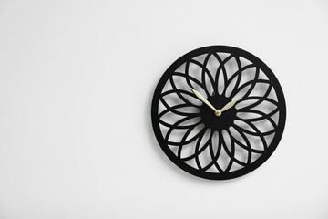 Stylish clock on white background. Time concept
