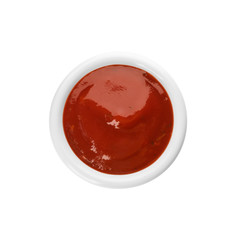 Bowl of spicy chili sauce on white background, top view