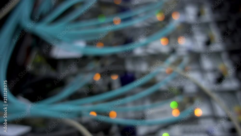Poster blinking server and datacenter lights. internet optical servers background blur