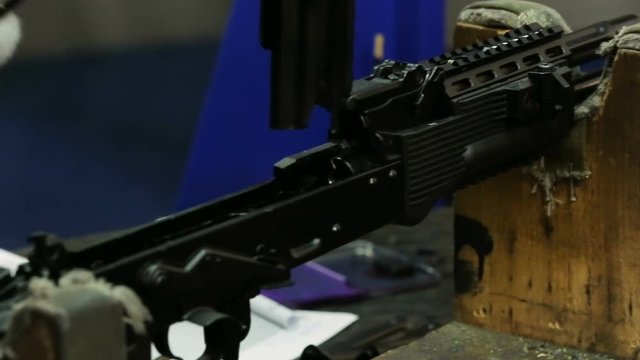 Assembling weapons in the workplace. Assaul rifles. Close up view