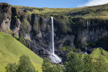 Waterfall along the south coast of Iceland on a summer day