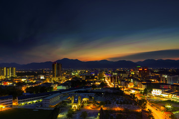 Fototapeta na wymiar Scenery of Sunset at Ipoh,Perak,Malaysia with aerial view. Soft focus,Blur due to Long Exposure. Visible Noise due to High ISO.