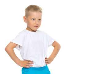 A little boy in a white T-shirt.