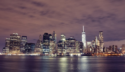 Naklejka na ściany i meble Manhattan skyline by night, New York City 