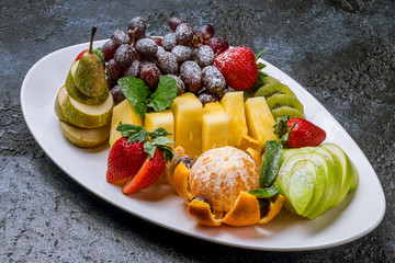 Fruits on a white plate