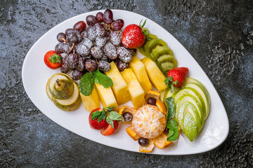 Fruits on a white plate