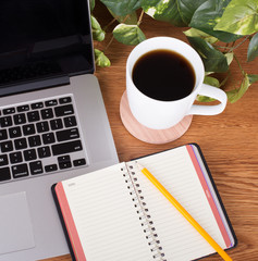 Notebook and Laptop Computer on a Desk on a Desk