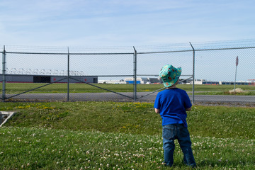 Kid looking for planes