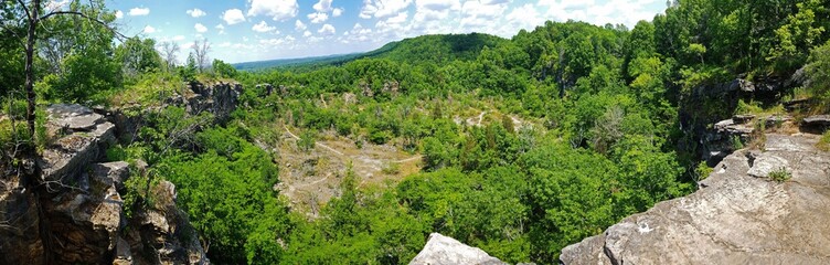 Fototapeta na wymiar A panoramic view of an old quarry.